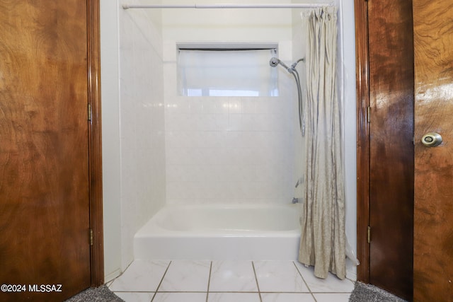 bathroom featuring shower / bath combination with curtain