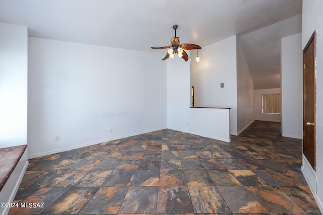 unfurnished living room with ceiling fan