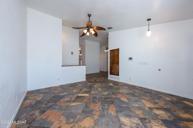 unfurnished living room with ceiling fan