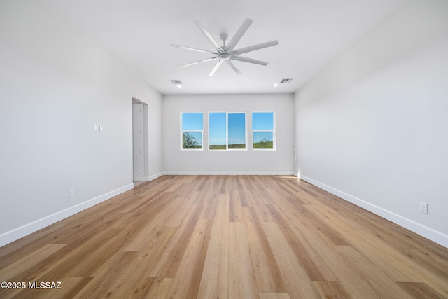 67970 E Madison Rd, Oracle, AZ 85623 - spare room featuring light wood-style floors and ceiling fan