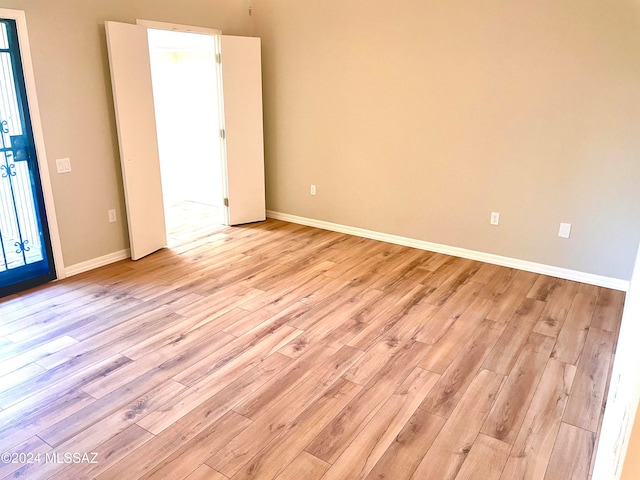 empty room featuring light hardwood / wood-style floors