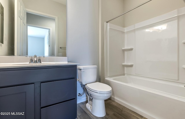 8257 S Silver Oak Dr, Tucson, AZ 85747 - bathroom featuring wood finished floors, toilet, vanity, and shower / bath combination