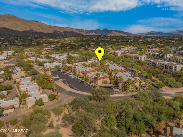 drone / aerial view featuring a mountain view