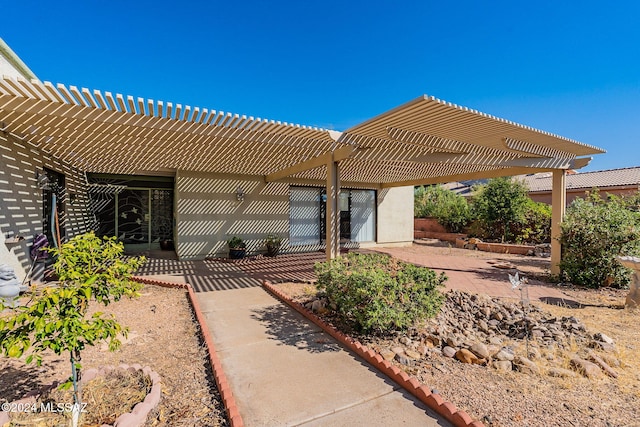 exterior space with a pergola