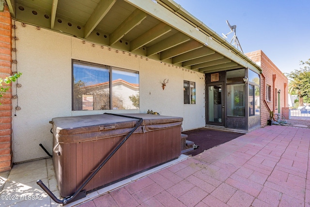 view of patio featuring a hot tub