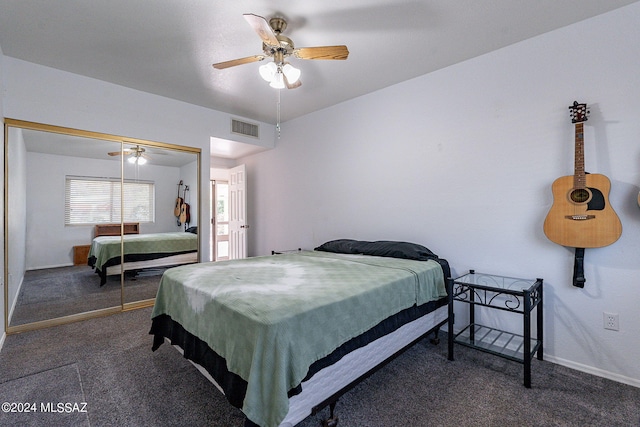 bedroom with ceiling fan, a closet, and dark carpet