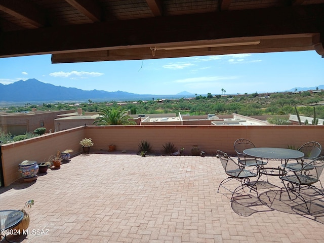 view of patio with a mountain view