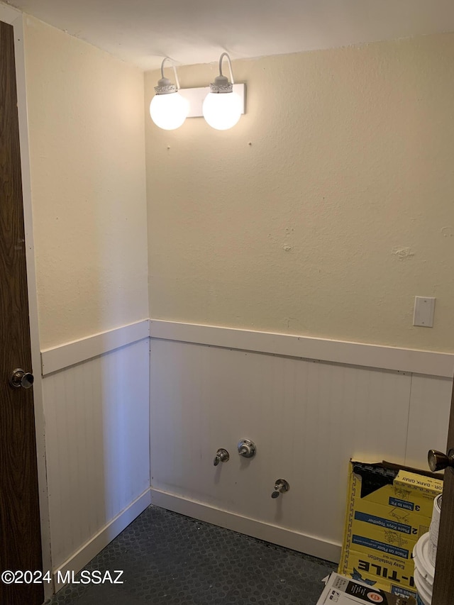 6352 N Barcelona Ln Unit 106, Tucson, AZ 85704 - clothes washing area with wainscoting