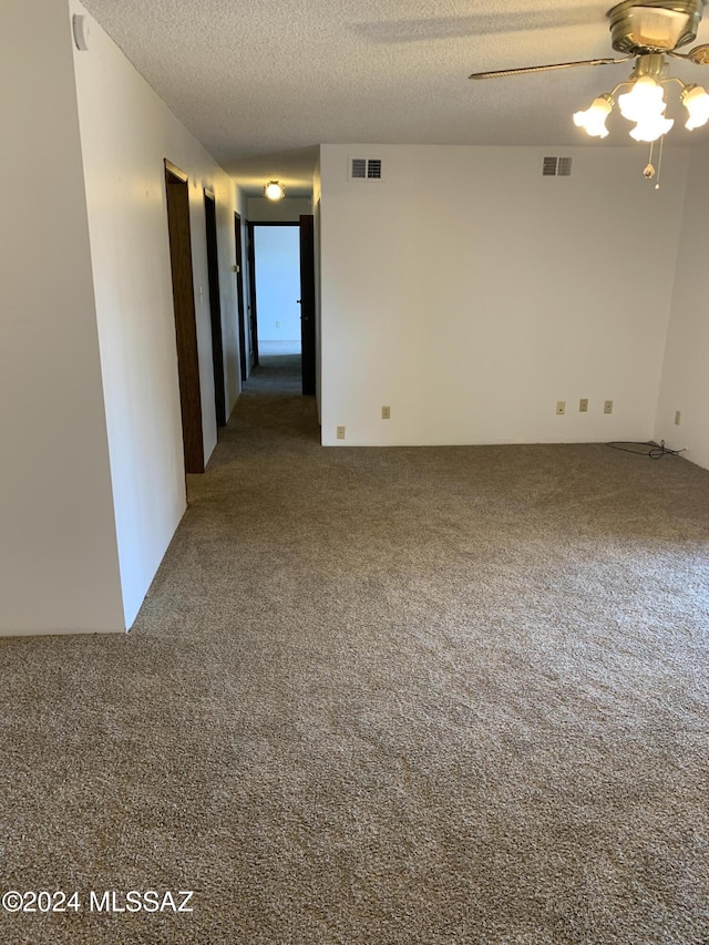 6352 N Barcelona Ln Unit 106, Tucson, AZ 85704 - carpeted spare room featuring a ceiling fan and a textured ceiling