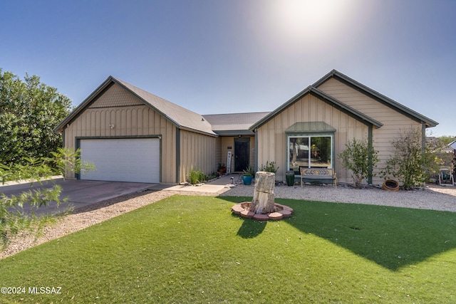 ranch-style house with a front lawn and a garage