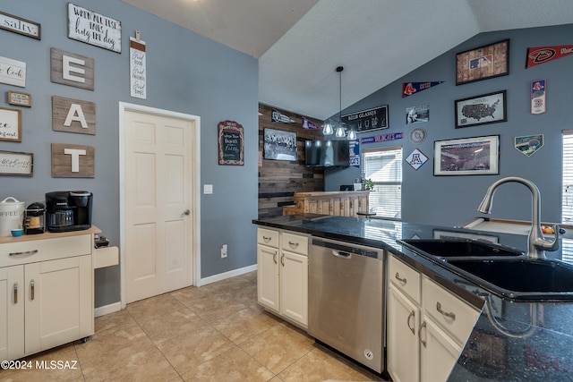 kitchen featuring dishwasher, vaulted ceiling, hanging light fixtures, and a textured ceiling