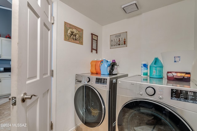 laundry area featuring washing machine and dryer