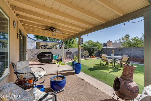 view of patio featuring a grill and ceiling fan