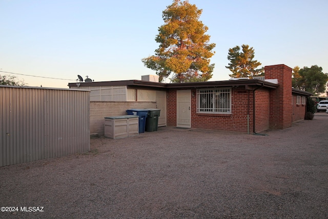 view of property exterior at dusk