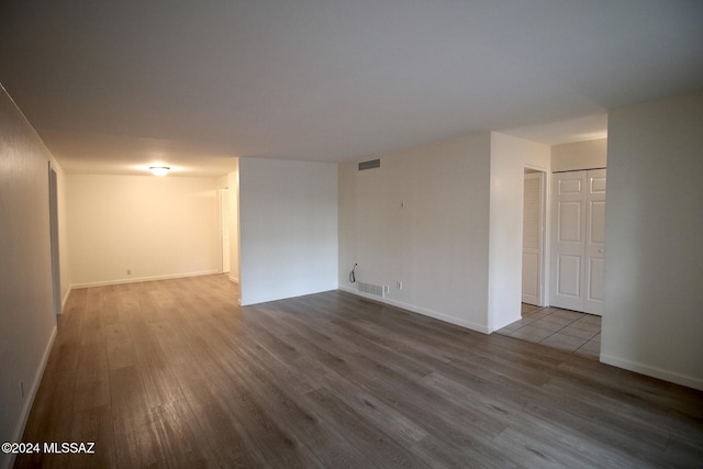 unfurnished room featuring light wood-type flooring