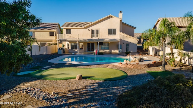 view of pool featuring a patio