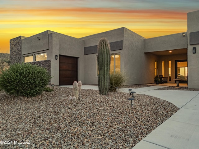 view of front of property with a patio