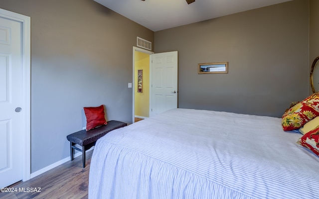 bedroom featuring hardwood / wood-style flooring