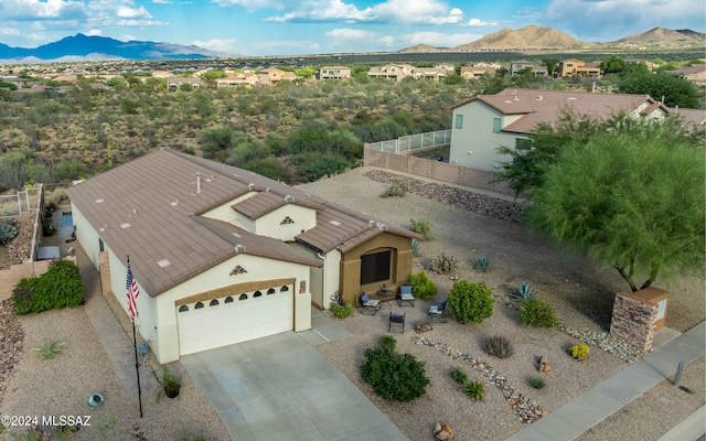 drone / aerial view featuring a mountain view