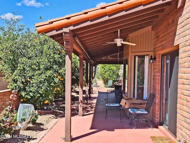 view of patio featuring ceiling fan