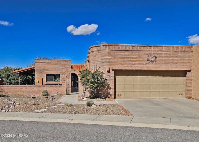 view of front of property featuring a garage