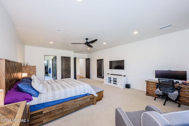 carpeted bedroom with ceiling fan