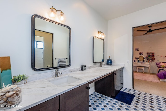 bathroom featuring vanity and ceiling fan