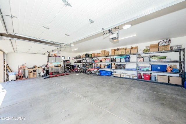 garage featuring a garage door opener