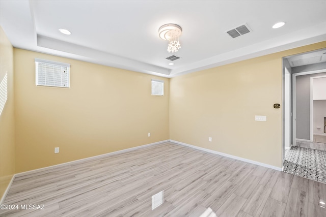 unfurnished room featuring light hardwood / wood-style flooring