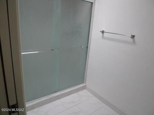 bathroom with walk in shower