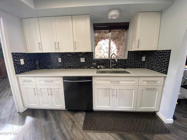 kitchen with dishwasher, white cabinets, sink, and dark wood-type flooring