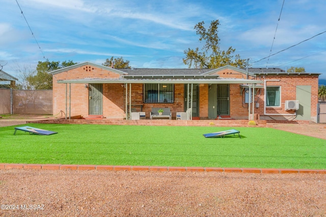 view of front of house featuring a front lawn