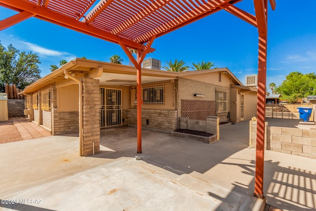 view of patio / terrace featuring a pergola