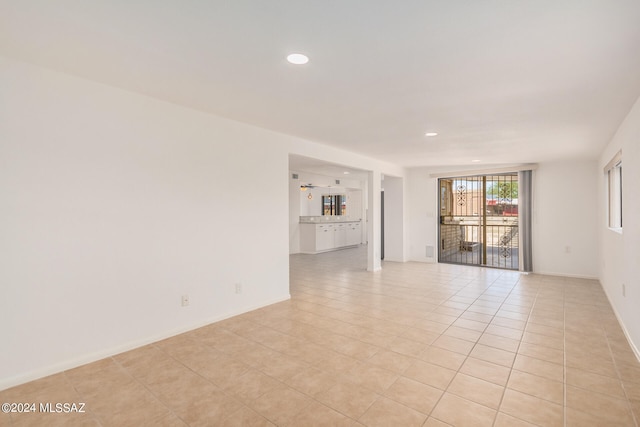 empty room featuring light tile patterned floors