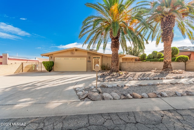 view of front of home featuring a garage