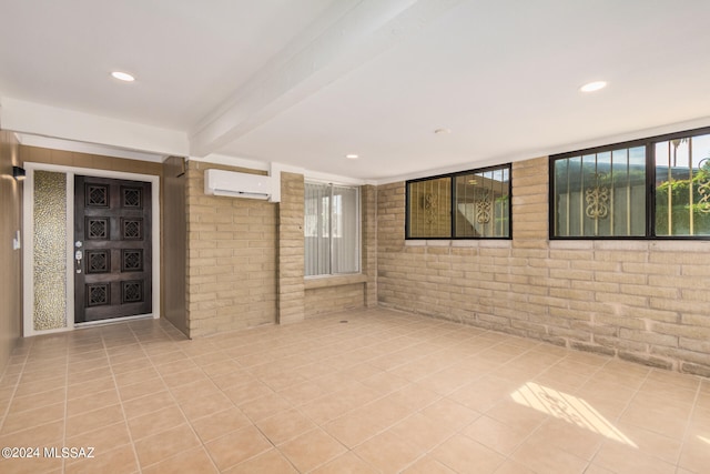 view of patio with a wall mounted AC