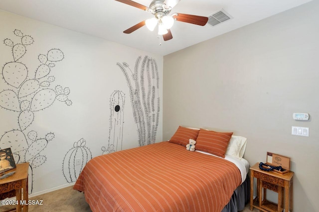 bedroom with ceiling fan and carpet floors