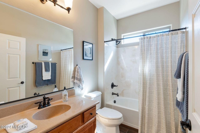 full bathroom with vanity, shower / bath combination with curtain, and toilet