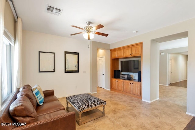 living room with ceiling fan