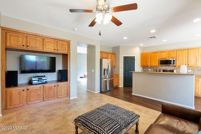 living room featuring ceiling fan