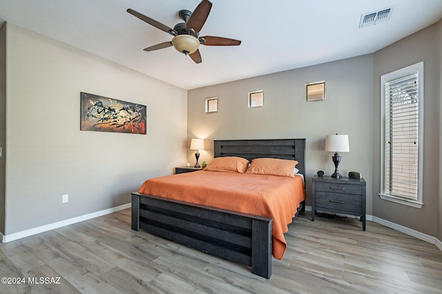 bedroom featuring ceiling fan and light hardwood / wood-style flooring