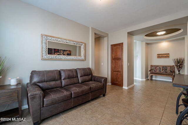 living room featuring tile patterned flooring