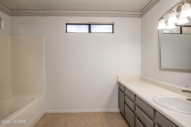 bathroom with tile patterned flooring and vanity