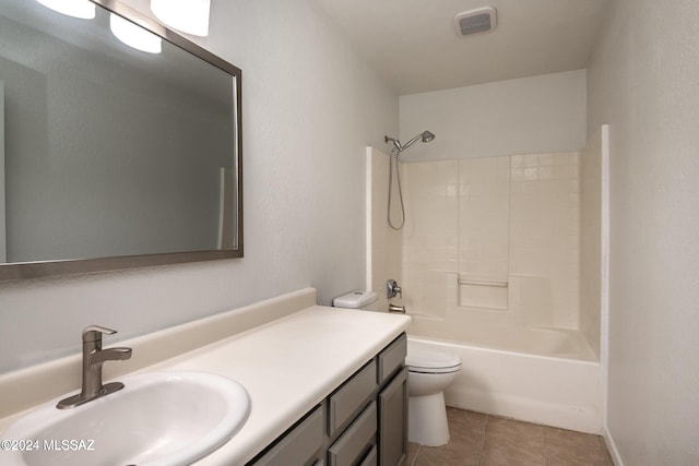 full bathroom with tile patterned flooring, tub / shower combination, vanity, and toilet