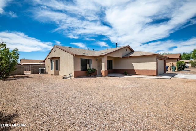 single story home with central AC and a patio