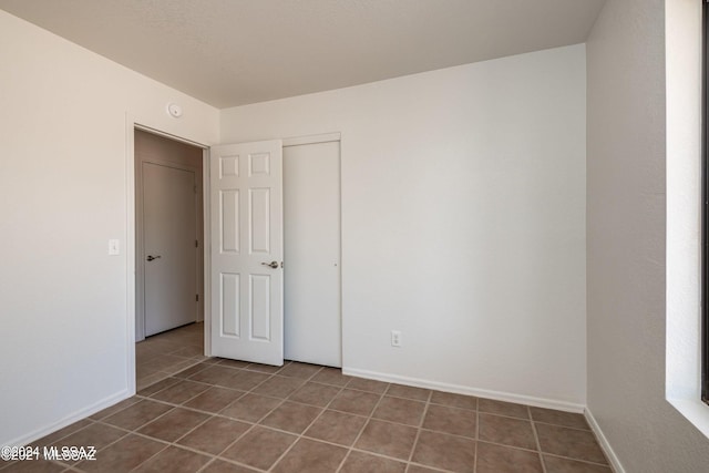 view of tiled spare room