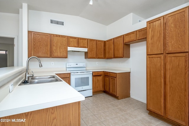 kitchen with lofted ceiling, white electric range oven, sink, and light tile patterned floors