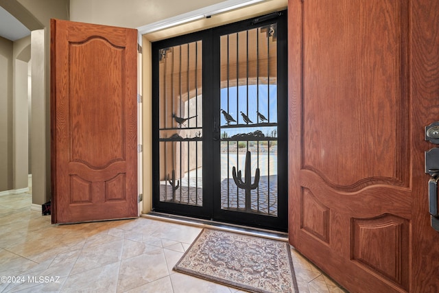 view of tiled entrance foyer