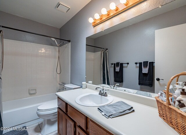 full bathroom with toilet, tile patterned flooring, vanity, and shower / bathtub combination with curtain