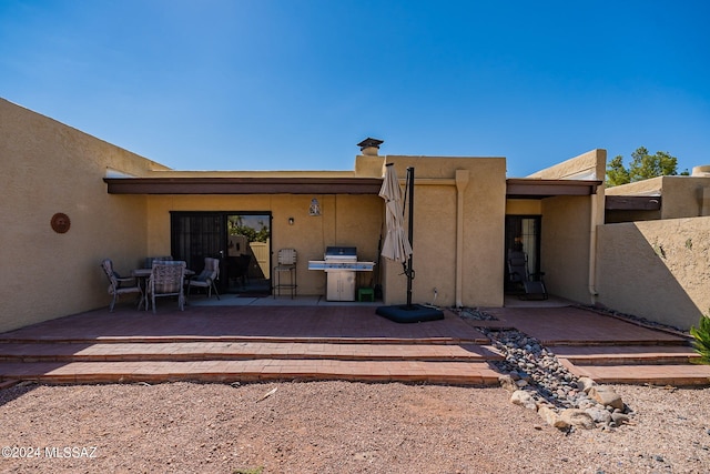 back of house featuring a patio area